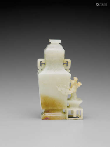 A SMALL CELADON JADE VASE AND COVER