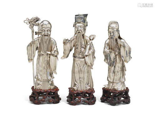 Late Qing dynasty/Republic period A SILVER SET OF THE 'THREE STAR GODS'