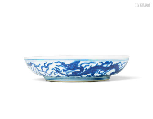 Wanli six-character mark and of the period A BLUE AND WHITE 'DRAGON' DISH