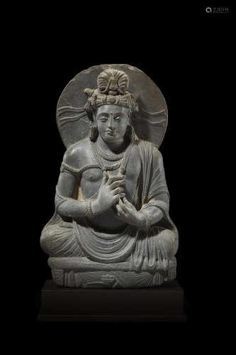 ANCIENT REGION OF GANDHARA, CIRCA 3RD/4TH CENTURY A SCHIST FIGURE OF MAITREYA