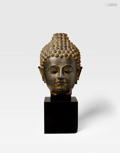 NORTHERN THAILAND, LAN NA PERIOD, 14TH/15TH CENTURY A COPPER ALLOY HEAD OF BUDDHA