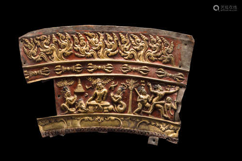 NEPAL OR TIBET, CIRCA 14TH CENTURY A GILT AND POLYCHROMED COPPER REPOUSSÉ MANDALA PANELWITH INDRA AND KANHAPA