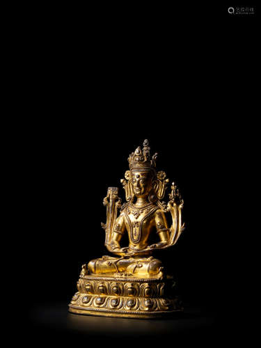 TIBET, 14TH/15TH CENTURY A GILT COPPER ALLOY FIGURE OF KUNZANG AKOR