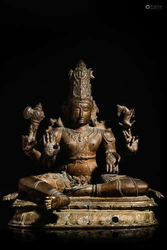 SOUTH INDIA, VIJAYANAGARA PERIOD, 15TH/16TH CENTURY A COPPER ALLOY FIGURE OF SHIVA SUKHASANAMURTI