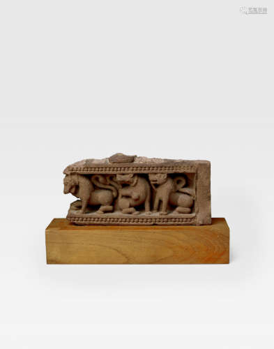 NORTH INDIA, 10TH/11TH CENTURY A RED SANDSTONE FREIZE WITH LIONS