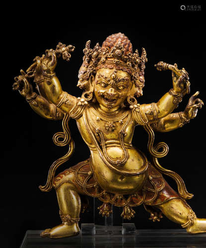 CENTRAL TIBET, 15TH CENTURY A GILT COPPER ALLOY FIGURE OF BHURKUMKUTA 