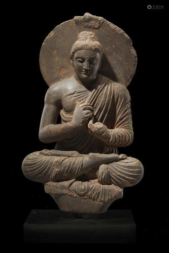 ANCIENT REGION OF GANDHARA, 3RD/4TH CENTURY  A SCHIST FIGURE OF PREACHING BUDDHA