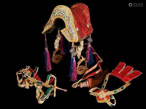 TIBET, CIRCA 18TH AND 19TH CENTURY A PARCEL GILT SILVER AND GILT COPPER ALLOY REPOUSSÉ SADDLE WITH ASSOCIATED GOLD DAMASCENED STIRRUPS AND BRIDLE SET