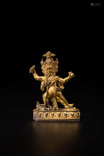 TIBET, CIRCA 12TH CENTURY A GILT COPPER ALLOY FIGURE OF MAHACHAKRA VAJRAPANI