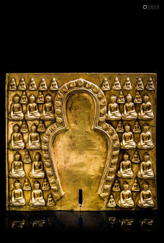 CENTRAL TIBET, DENSATIL, 15TH CENTURY  A GILT COPPER ALLOY PLAQUE WITH BUDDHAS