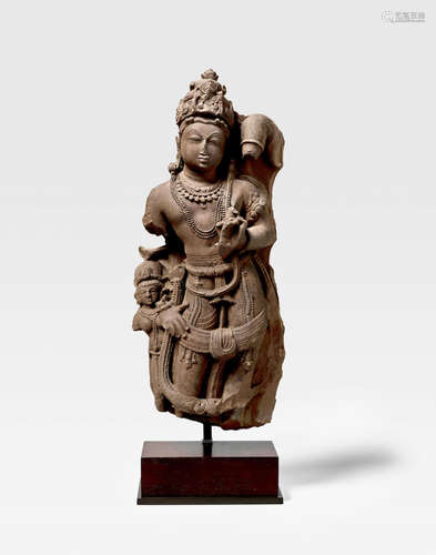 NORTH INDIA, RAJASTHAN, 10TH CENTURY A RED SANDSTONE CHAURI BEARER