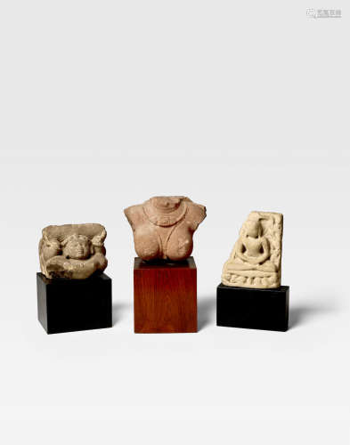 NORTH INDIA, 6TH-12TH CENTURY A GROUP OF THREE SANDSTONE SCULPTURES