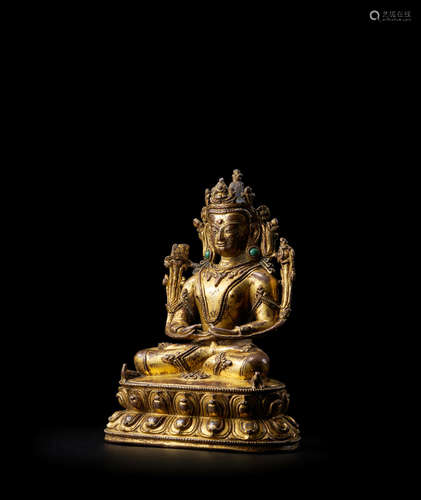 TIBET, 14TH CENTURY A GILT COPPER ALLOY FIGURE OF KUNZANG AKOR