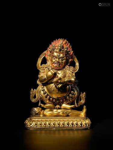 TIBET, CIRCA 17TH CENTURY A GILT COPPER ALLOY FIGURE OF PANJARANATA MAHAKALA