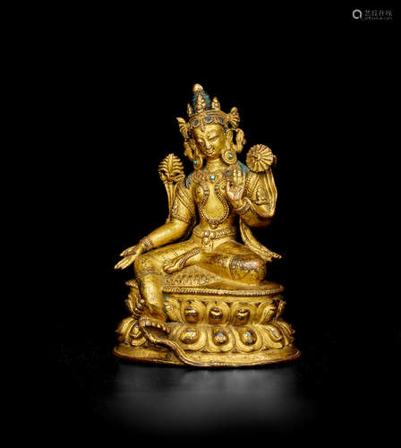 NEPAL, KHASA MALLA, 13TH/14TH CENTURY A GILT COPPER ALLOY FIGURE OF TARA