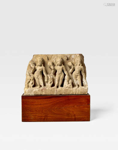 NORTH INDIA, UTTAR PRADESH, CIRCA 8TH CENTURY A CHUNAR SANDSTONE STELE WITH BODHISATTVAS OR NAVAGRAHA