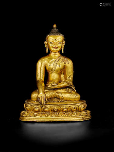 NEPAL, 15TH CENTURY A GILT COPPER ALLOY FIGURE OF BUDDHA