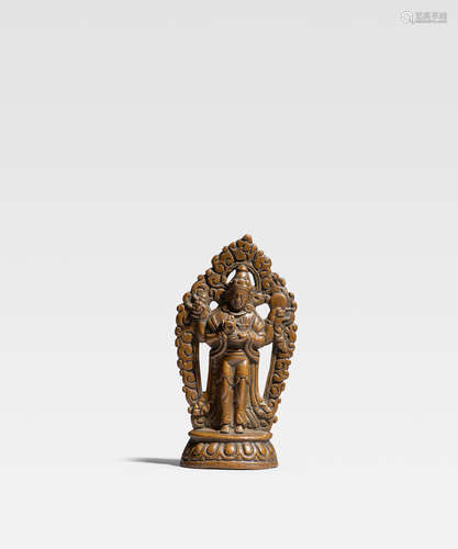 TIBET, CIRCA 17TH CENTURY A COPPER ALLOY FIGURE OF EYE-CLEARING AVALOKITESHVARA