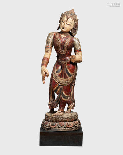 NEPAL, MID 15TH/16TH CENTURY A POLYCHROMED WOOD FIGURE OF NRTYADEVI, GODDESS OF DANCE