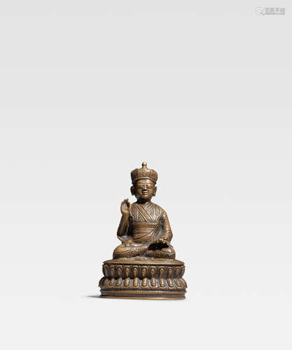 TIBET, CIRCA 16TH CENTURY A COPPER ALLOY FIGURE OF A BON TEACHER