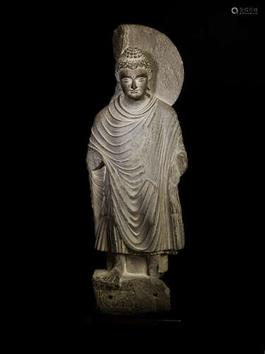 ANCIENT REGION OF GANDHARA, CIRCA 3RD CENTURY A SCHIST FIGURE OF BUDDHA