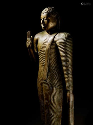 SRI LANKA, KANDYAN PERIOD, 18TH CENTURY A COPPER ALLOY FIGURE OF BUDDHA