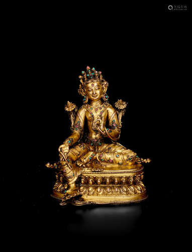 TIBET, DENSATIL STYLE, CIRCA 14TH CENTURY A GILT COPPER ALLOY FIGURE OF TARA