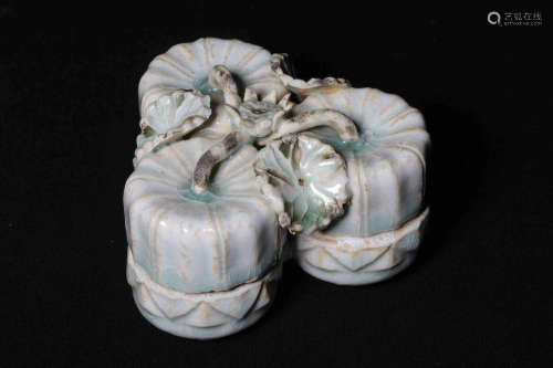 CELADON AND CARVED TRI-LINKED 'LOTUS' BOX WITH COVER