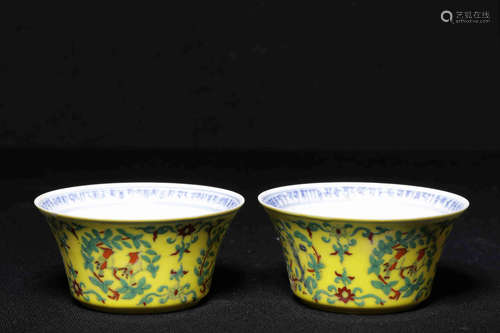 PAIR OF WUCAI YELLOW GROUND 'FLOWERS AND BIRDS' CUPS