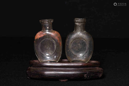 PAIR OF GLASS SNUFF BOTTLES WITH STAND