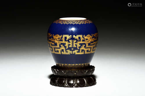 A SMALL GILTED BLUE-GLAZED JAR