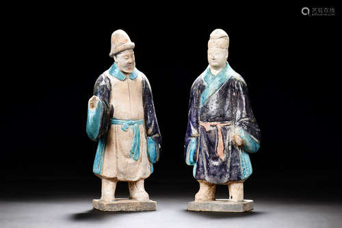 TWO CLAY AND PAINTED 'PERSON' FIGURES