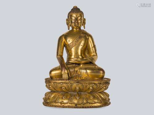 A Rare Gilt Bronze Figure of Shakyamuni, Tibet 13-14th Century.