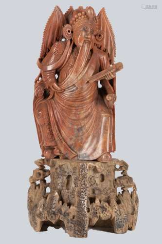 A Carved Hardstone Figurine.