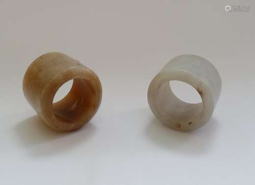 A Two Chinese jade archer's rings.