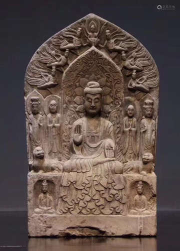 A BLUE STONE CARVED BUDDHA WITH BASE