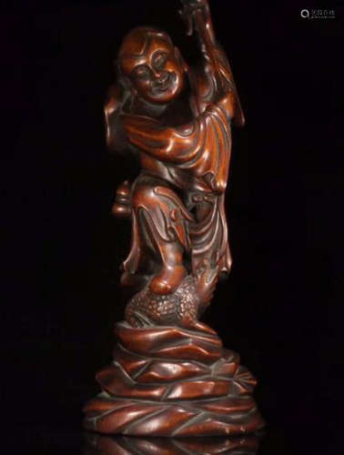 A CHENXIANG WOOD CARVED STORY SHAPED ORNAMENT