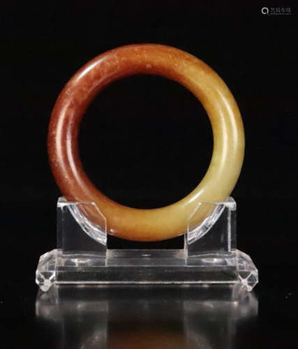 A HETIAN JADE CARVED BANGLE