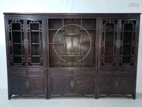 A ZITAN WOOD CARVED BOOKCASE