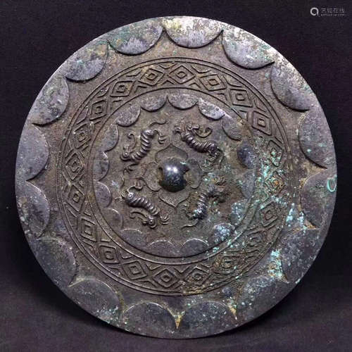 A BRONZE CASTED MIRROR