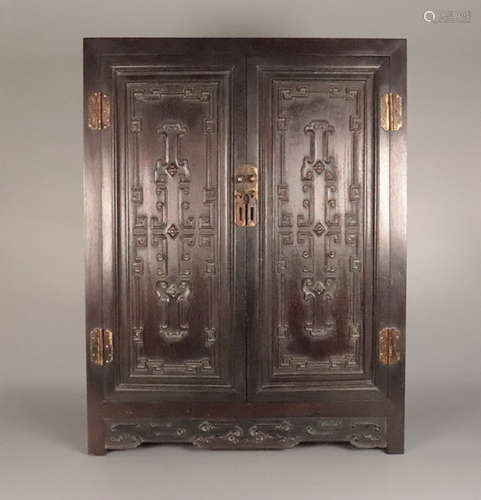 A ZITAN WOOD CARVED BOGU PATTERN BOOKCASE