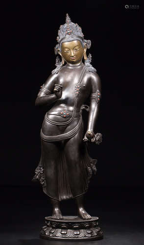 A BRONZE CASTED GEM DECORATED HIMALAYAN BUDDHA