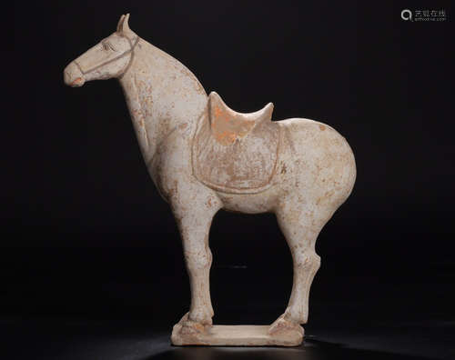 A TANG DYNASTY PAINTED POTTERY HORSE ORNAMENT