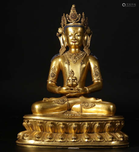 A TIBETAN GILT BRONZE BUDDHA