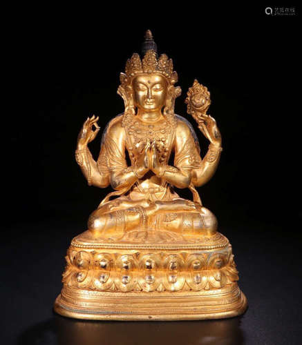 A TIBETAN GILT BRONZE MULTI ARMS GUANYIN BUDDHA