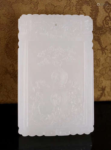 A HETIAN WHITE JADE CARVED CHILD PATTERN PAI