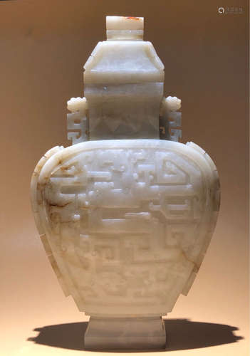 A HETIAN JADE CARVED BEAST PATTERN BOTTLE