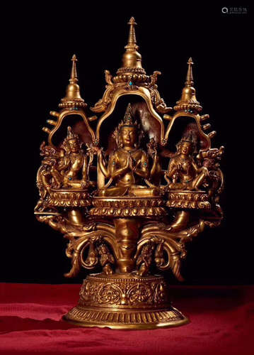 A GLIT BRONZE MULTI ARMS GUANYIN BUDDHA