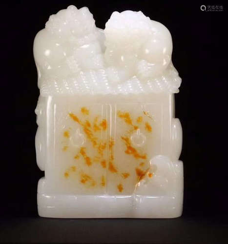 A HETIAN JADE CARVED EMBOSS LION SHAPED ORNAMENT