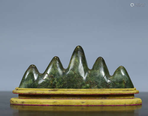 A GREEN JADE CARVED BRUSH HOLDER